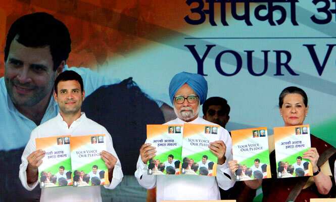 Prime Minister Manmohan Singh, Congress president Sonia Gandhi and party vice-president Rahul Gandhi releasing the party's election manifesto at AICC Headquarters in New Delhi. (PTI Photo)
</div) Prime Minister Manmohan Singh, Congress president Sonia Gandhi and party vice-president Rahul Gandhi releasing the party's election manifesto at AICC Headquarters in New Delhi. (PTI Photo)
</div)