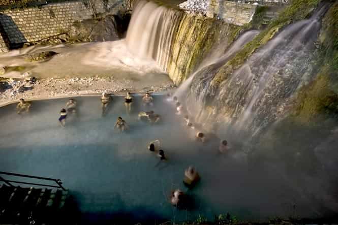 This picture shows people bathing at a hot spring of Loutraki or Pozar near the village of Aridea in northern Greece. (AFP photo)
</div) This picture shows people bathing at a hot spring of Loutraki or Pozar near the village of Aridea in northern Greece. (AFP photo)
</div)