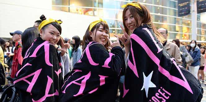 Three Japanese fans of K-Pop group, Supernova, or 'Choshinsei' in Japanese language, pose in front of the Yokohama Arena awaiting for the K-Pop chart show 'M Countdown' in Yokohama. (AFP photo)
</div) Three Japanese fans of K-Pop group, Supernova, or 'Choshinsei' in Japanese language, pose in front of the Yokohama Arena awaiting for the K-Pop chart show 'M Countdown' in Yokohama. (AFP photo)
</div)