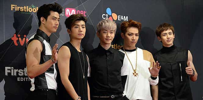 Members of South Korean K-Pop group 2PM pose during a press conference prior to attending the K-Pop chart show 'M Countdown' at the Yokohama Arena in Yokohama. (AFP photo)
</div) Members of South Korean K-Pop group 2PM pose during a press conference prior to attending the K-Pop chart show 'M Countdown' at the Yokohama Arena in Yokohama. (AFP photo)
</div)