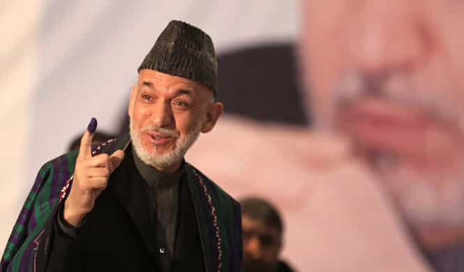 Afghan President Hamid Karzai shows indelible ink on his finger to the media before he casts his vote at Amani High School, near the presidential palace in Kabul. (AP Photo) Afghan President Hamid Karzai shows indelible ink on his finger to the media before he casts his vote at Amani High School, near the presidential palace in Kabul. (AP Photo)