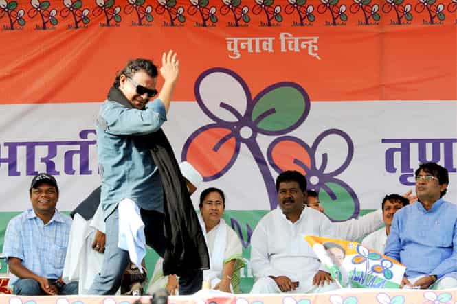 West Bengal chief minister and Trinamool Congress chief Mamata Banerjee looks on as party leader actor Mithun Chakrborty gestures at an election rally in Ranchi. (PTI photo)
</div) West Bengal chief minister and Trinamool Congress chief Mamata Banerjee looks on as party leader actor Mithun Chakrborty gestures at an election rally in Ranchi. (PTI photo)
</div)
