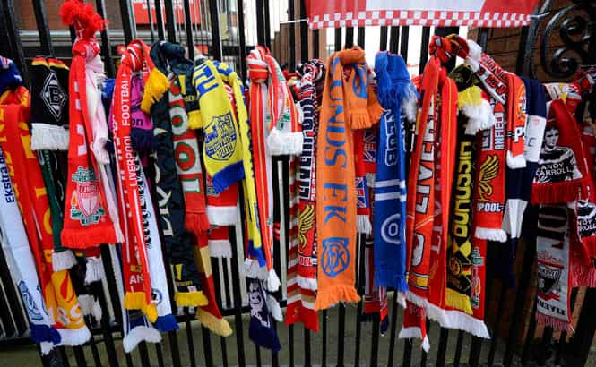 Scarves are tied to a gate by the Hillsborough memorial ahead the English Premier League soccer match between Liverpool and Manchester City at Anfield in Liverpool. (Reuters Photo) Scarves are tied to a gate by the Hillsborough memorial ahead the English Premier League soccer match between Liverpool and Manchester City at Anfield in Liverpool. (Reuters Photo)