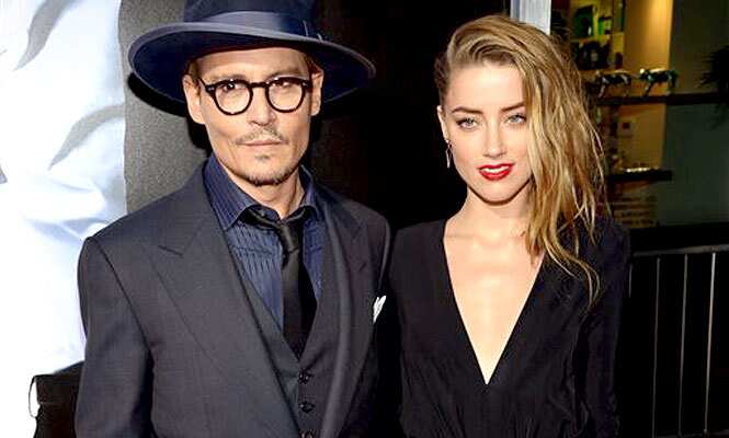 Johnny Depp and Amber Heard. Johnny Depp and Amber Heard.