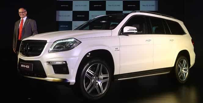Mercedes-Benz India Managing Director Eberhard Kern poses with the new GL 63 AMG during its launch in Mumbai on April 15, 2014. (AFP Photo)