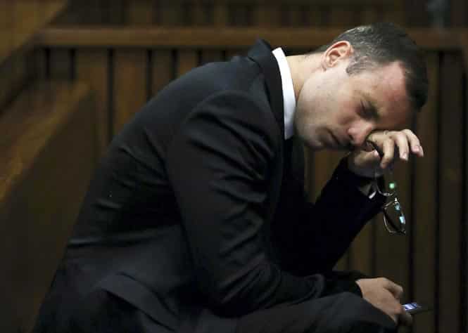 Oscar Pistorius reacts during his trial at the North Gauteng High Court in Pretoria. (AFP photo) Oscar Pistorius reacts during his trial at the North Gauteng High Court in Pretoria. (AFP photo)