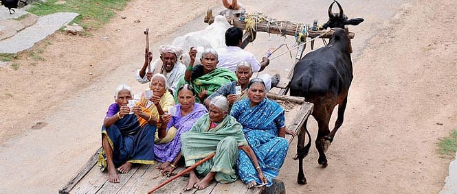 Senior citizens being carried on a bullock cart for casting votes near Chikmagalur in Karnataka. Photo by PTI Senior citizens being carried on a bullock cart for casting votes near Chikmagalur in Karnataka. Photo by PTI