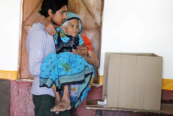 An elderly woman being carried at a polling station in Murad Nagar, Ghaziabad. Photo by PTI An elderly woman being carried at a polling station in Murad Nagar, Ghaziabad. Photo by PTI