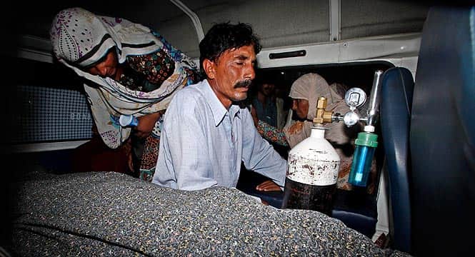 Pakistani relatives transport the body of a pregnant woman who was beaten to death with bricks by members of her own family for marrying a man of her own choice in Lahore. (AFP Photo)</em) Pakistani relatives transport the body of a pregnant woman who was beaten to death with bricks by members of her own family for marrying a man of her own choice in Lahore. (AFP Photo)</em)