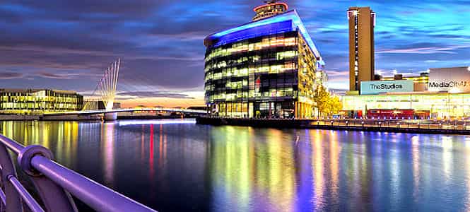 A colourful Media City in Salford Quays, Manchester pictured during sunset. (Getty Image)</font></em) A colourful Media City in Salford Quays, Manchester pictured during sunset. (Getty Image)</font></em)