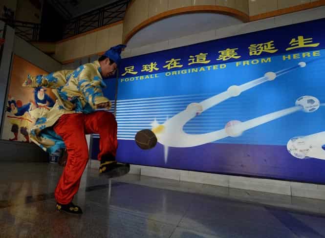 This photo shows a traditional Chinese Cuju football player at the Linzi Football Museum in Zibo, Shandong Province. (AFP photo)
</div) This photo shows a traditional Chinese Cuju football player at the Linzi Football Museum in Zibo, Shandong Province. (AFP photo)
</div)