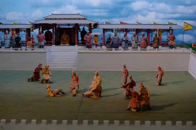 This photo shows a miniture model illustrating a traditional Chinese Cuju football game at the Linzi Football Museum in Zibo, Shandong Province. (AFP photo)
</div) This photo shows a miniture model illustrating a traditional Chinese Cuju football game at the Linzi Football Museum in Zibo, Shandong Province. (AFP photo)
</div)