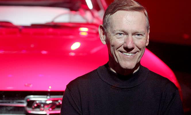 Alan Mulally, president and chief executive officer of Ford Motor Company, posing for a photo at the 50-years celebration ceremony of the Ford Mustang, ahead of the 'Auto China 2014' in Beijing.(AFP PHOTO) Ford shows off 'smart' Mustang at Taiwan tech show