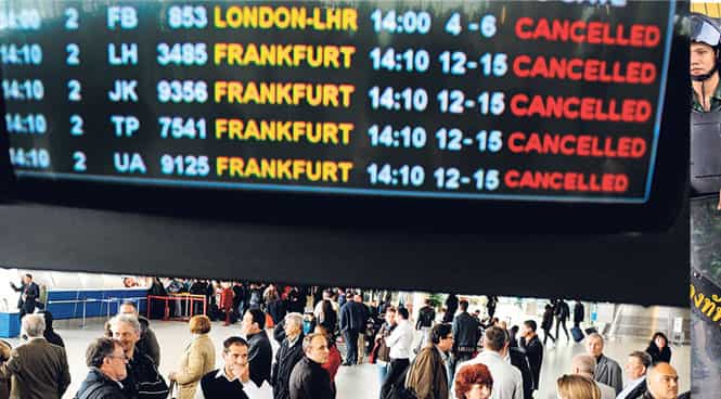 People stand in front of an information board at Sofia airport on April 16, 2010, as flights were cancelled due to ash from a volcano eruption in Iceland. (Photo: AFP)</font></em) People stand in front of an information board at Sofia airport on April 16, 2010, as flights were cancelled due to ash from a volcano eruption in Iceland. (Photo: AFP)</font></em)