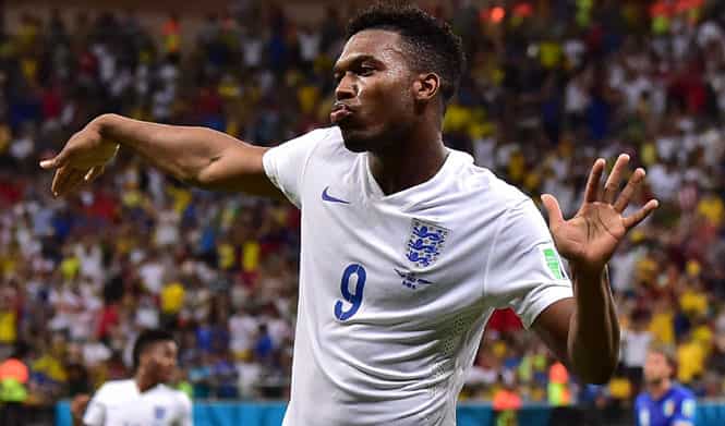 England's forward Daniel Sturridge celebrates after scoring a goal during their World Cup match against Italy at the Amazonia Arena in Manaus. (AFP Photo) 
</div)
