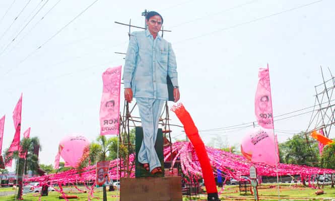 Preparations underway for the swearing-in ceremony of Telangana Rashtriya Samithi (TRS) government in Hyderabad. (PTI photo)</em>
</div) Preparations underway for the swearing-in ceremony of Telangana Rashtriya Samithi (TRS) government in Hyderabad. (PTI photo)</em>
</div)