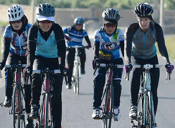 Members of the Afghan national women's cycling team riding their road bikes in Paghman district of Kabul province. (AFP Photo)</em) Members of the Afghan national women's cycling team riding their road bikes in Paghman district of Kabul province. (AFP Photo)</em)