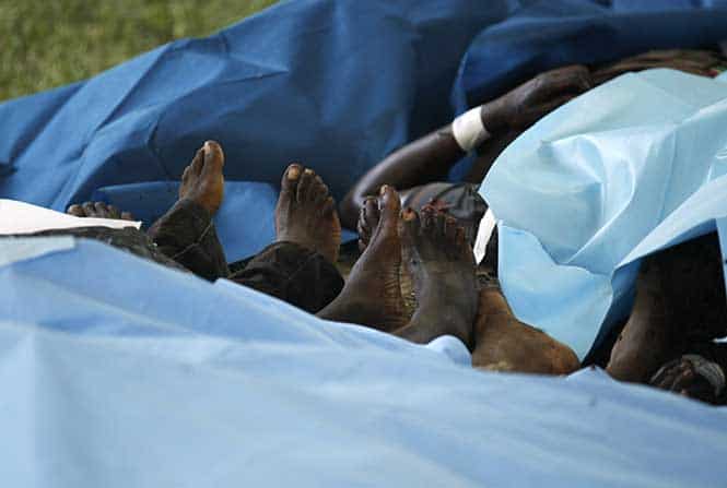 Slain bodies of people killed when gunmen attacked the coastal Kenyan town of Mpeketoni are seen covered at the mortuary in Mpeketoni. (Reuters Photo)</em) Slain bodies of people killed when gunmen attacked the coastal Kenyan town of Mpeketoni are seen covered at the mortuary in Mpeketoni. (Reuters Photo)</em)