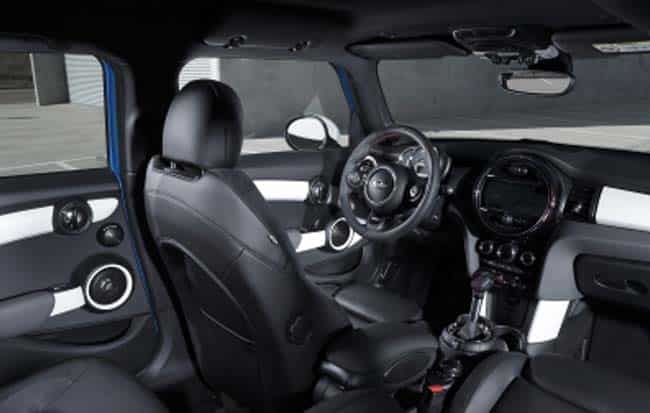 And there's room in the back for three passengers. Photo:AFP Mini's new model opens the doors to new drivers