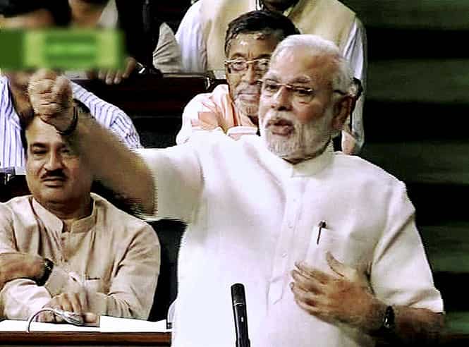 Narendra Modi during the discussion on President's address in Lok Sabha in New Delhi. (PTI Photo / TV Grab)</em) Narendra Modi during the discussion on President's address in Lok Sabha in New Delhi. (PTI Photo / TV Grab)</em)