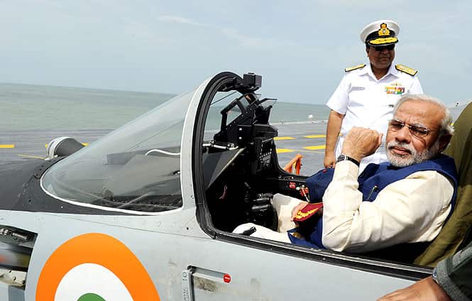 PM Modi sits in an aircraft onboard INS Vikramaditya in Goa. (AFP Photo)</em) PM Modi sits in an aircraft onboard INS Vikramaditya in Goa. (AFP Photo)</em)