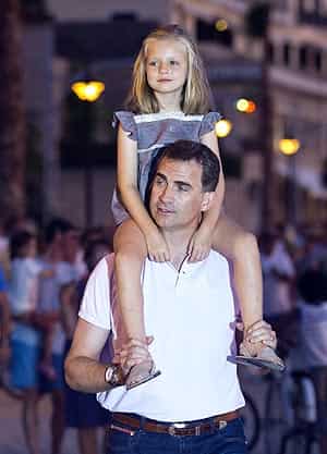 Prince Felipe walks with his daughter Leonor on his shoulders in Port Soller on Mallorca island. (AFP file photo)</em) Prince Felipe walks with his daughter Leonor on his shoulders in Port Soller on Mallorca island. (AFP file photo)</em)