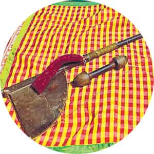 A contemporary balaposh quilt with the tool for carding cotton wool. (Photo credit: The book courtesy Niyogi books)</em) A contemporary balaposh quilt with the tool for carding cotton wool. (Photo credit: The book courtesy Niyogi books)</em)