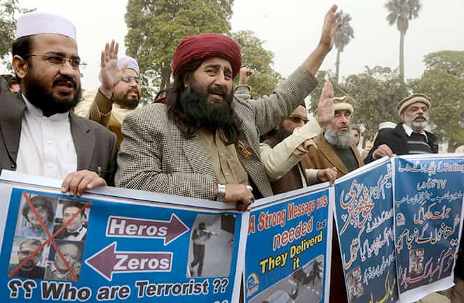 Peshawar demonstrators march with placards during a solidarity rally for the two killed assailants who attacked French satirical weekly Charlie Hebdo. AFP Photo Peshawar demonstrators march with placards during a solidarity rally for the two killed assailants who attacked French satirical weekly Charlie Hebdo. AFP Photo