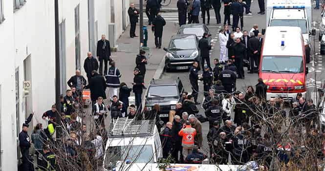 General view of police and rescue vehicles at the scene after a shooting at the Paris offices of Charlie Hebdo, a satirical newspaper, on January 7, 2015. Reuters Photo