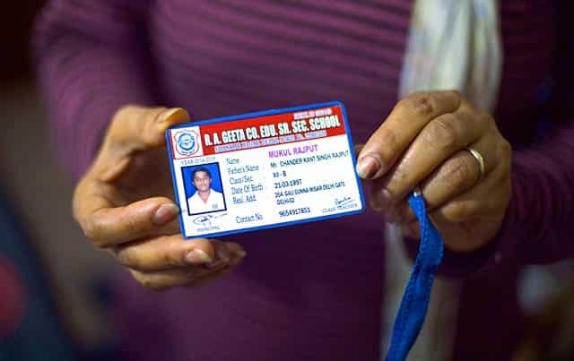 In this photograph taken on February 22, 2015, Anita Rajput poses with the school identity card of her 18-year-old son Mukul Rajput, after his death in a road accident in New Delhi. AFP Photo In this photograph taken on February 22, 2015, Anita Rajput poses with the school identity card of her 18-year-old son Mukul Rajput, after his death in a road accident in New Delhi. AFP Photo