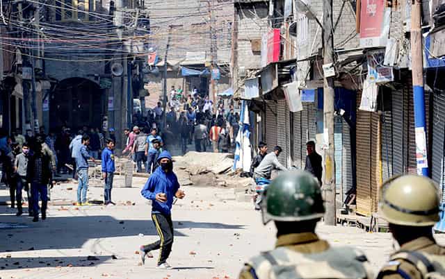 Demonstrators clash with police during a protest in Srinagar against a government proposal to create exclusive settlements for Kashmiri Pandits. AFP Photo Demonstrators clash with police during a protest in Srinagar against a government proposal to create exclusive settlements for Kashmiri Pandits. AFP Photo