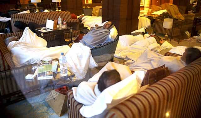 Hotel guests sleep inside the lobby of a luxury hotel following aftershocks, in Kathmandu, Nepal on April 27, 2015. (Reuters Photo/Athit Perawongmetha) Hotel guests sleep inside the lobby of a luxury hotel following aftershocks, in Kathmandu, Nepal on April 27, 2015. (Reuters Photo/Athit Perawongmetha)