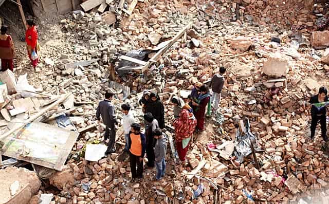 Local people search for belonging in a collapsed building, at Sundra Dharara area in Kathmandu, Nepal on April 27, 2015. (HT Photo/Raj K Raj) Local people search for belonging in a collapsed building, at Sundra Dharara area in Kathmandu, Nepal on April 27, 2015. (HT Photo/Raj K Raj)