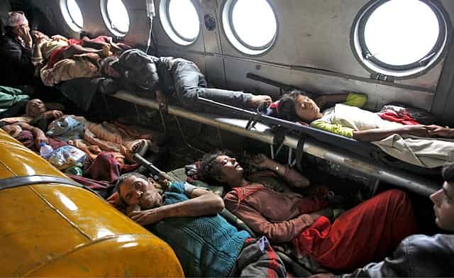 Victims of earthquake lie inside an Indian Air Force helicopter as they are evacuated from Trishuli Bazar to the airport in Kathmandu. (Reuters Photo/Jitendra Prakash) Victims of earthquake lie inside an Indian Air Force helicopter as they are evacuated from Trishuli Bazar to the airport in Kathmandu. (Reuters Photo/Jitendra Prakash)