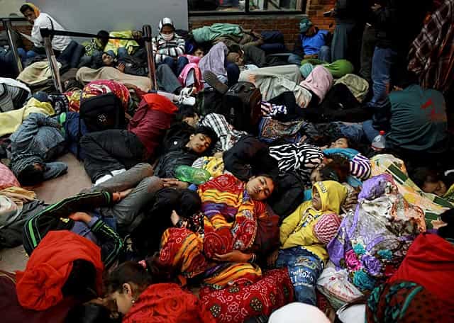 People sleep as they wait outside the departure terminal at the airport in Kathmandu, Nepal on April 27, 2015. (Reuters Photo/Danish Siddiqui) People sleep as they wait outside the departure terminal at the airport in Kathmandu, Nepal on April 27, 2015. (Reuters Photo/Danish Siddiqui)