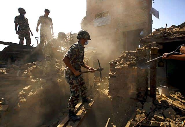 Nepalese army personnel search for victims trapped inside collapsed buildings following April 25 earthquake in Bhaktapur on April 27, 2015. (Reuters Photo/Navesh Chitrakar) Nepalese army personnel search for victims trapped inside collapsed buildings following April 25 earthquake in Bhaktapur on April 27, 2015. (Reuters Photo/Navesh Chitrakar)