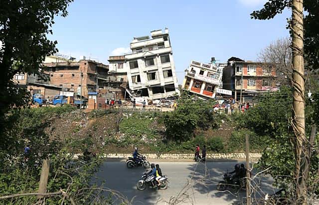 Damaged buildings lean to their sides in Kathmandu, Nepal on April 27, 2015. (AP Photo/Wally Santana) Damaged buildings lean to their sides in Kathmandu, Nepal on April 27, 2015. (AP Photo/Wally Santana)