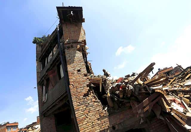 A man looks into his damaged house to recover belongings in Bhaktapur, Nepal on April 27, 2015. (Reuters Photo/Adnan Abidi) A man looks into his damaged house to recover belongings in Bhaktapur, Nepal on April 27, 2015. (Reuters Photo/Adnan Abidi)
