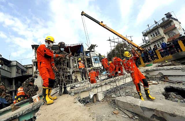 India's National Disaster Response Force (NDRF) personnel search for the victims at a collapsed house in Kathmandu, Nepal on April 29, 2015. Reuters/Adnan Abid) India's National Disaster Response Force (NDRF) personnel search for the victims at a collapsed house in Kathmandu, Nepal on April 29, 2015. Reuters/Adnan Abid)