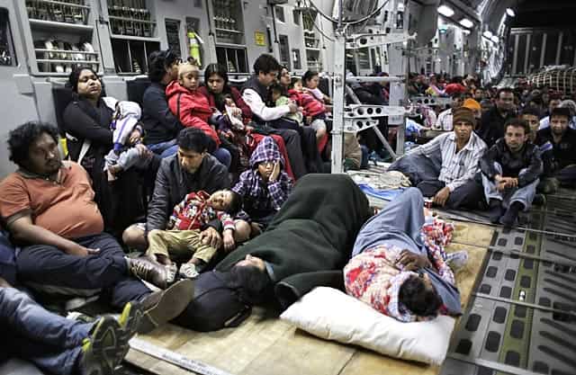 Injured people lie on the floor and survivors sit inside a military plane evacuating injured and stranded Indian's from Kathmandu to New Delhi during a midnight rescue mission by Indian Air Force, in Kathmandu, Nepal on April 29, 2015. (AP Photo/Altaf Qadri) Injured people lie on the floor and survivors sit inside a military plane evacuating injured and stranded Indian's from Kathmandu to New Delhi during a midnight rescue mission by Indian Air Force, in Kathmandu, Nepal on April 29, 2015. (AP Photo/Altaf Qadri)