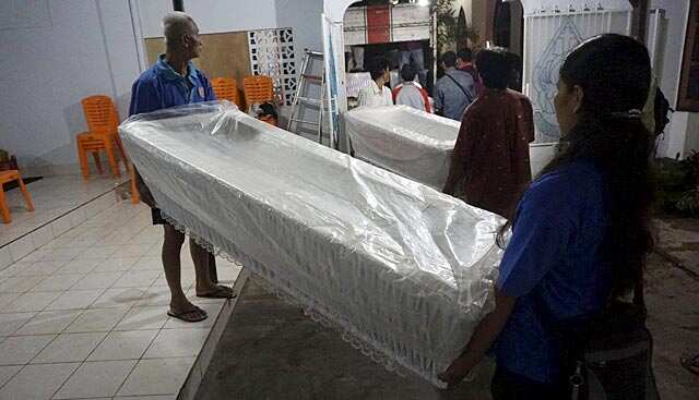 Coffins, bullets ready as Indonesia prepares to execute 8 foreigners ...