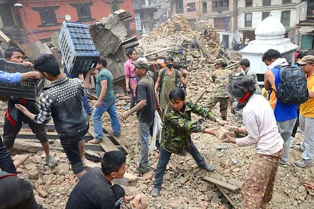 People clear rubble in Kathmandu's Durbar Square, a UNESCO World Heritage Site that was severely damaged. (AFP Photo/Prakash Mathema) People clear rubble in Kathmandu's Durbar Square, a UNESCO World Heritage Site that was severely damaged. (AFP Photo/Prakash Mathema)