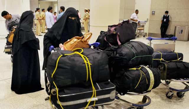 Indian nationals who were stranded in Yemen alight from the C17 after being evacuated from Djibouti, at International Airport in Mumbai. PTI Photo Indian nationals who were stranded in Yemen alight from the C17 after being evacuated from Djibouti, at International Airport in Mumbai. PTI Photo