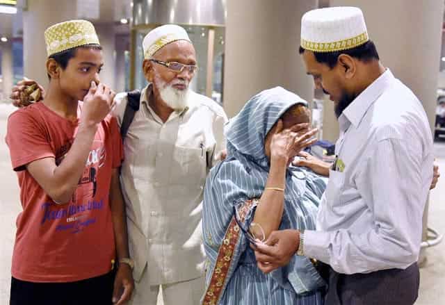 A relative receives one of the Indian nationals evacuated from Yemen, upon their arrival at the International Airport in Mumbai. PTI Photo A relative receives one of the Indian nationals evacuated from Yemen, upon their arrival at the International Airport in Mumbai. PTI Photo
