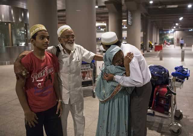 An Indian evacuee from Yemen hugs her son after arriving at the international airport in Mumbai. Reuters Photo An Indian evacuee from Yemen hugs her son after arriving at the international airport in Mumbai. Reuters Photo