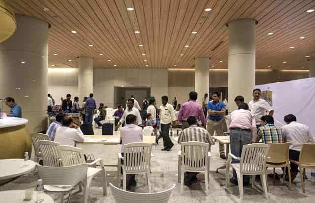 Officials work as Indian evacuees from Yemen arrive at the international airport in Mumbai. Reuters Photo Officials work as Indian evacuees from Yemen arrive at the international airport in Mumbai. Reuters Photo