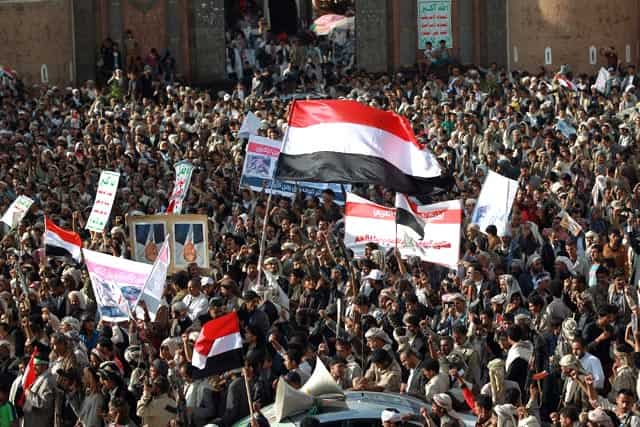Tribal gunmen loyal to the Huthi movement wave the national flag in the capital Sanaa during a demonstration against Saudi-led coalition’s Operation Decisive Storm against the Huthi rebels in Yemen. AFP Photo Tribal gunmen loyal to the Huthi movement wave the national flag in the capital Sanaa during a demonstration against Saudi-led coalition’s Operation Decisive Storm against the Huthi rebels in Yemen. AFP Photo