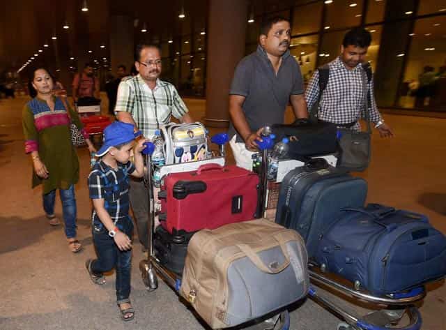 Indian nationals evacuated from Yemen, upon arrival at the International Airport in Mumbai. PTI Photo Indian nationals evacuated from Yemen, upon arrival at the International Airport in Mumbai. PTI Photo