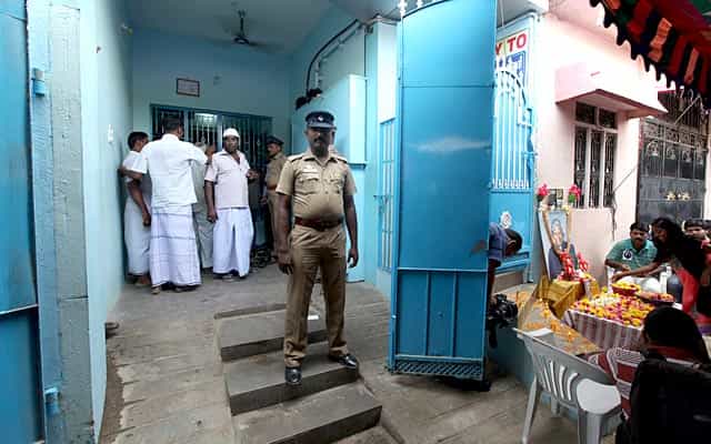 A police officer stands guard at Kalam's residence, where his ailing brother waits for his body in Rameswaram, Tamil Nadu on July 29, 2015. (HT Photo/Vivek Nair) A police officer stands guard at Kalam's residence, where his ailing brother waits for his body in Rameswaram, Tamil Nadu on July 29, 2015. (HT Photo/Vivek Nair)