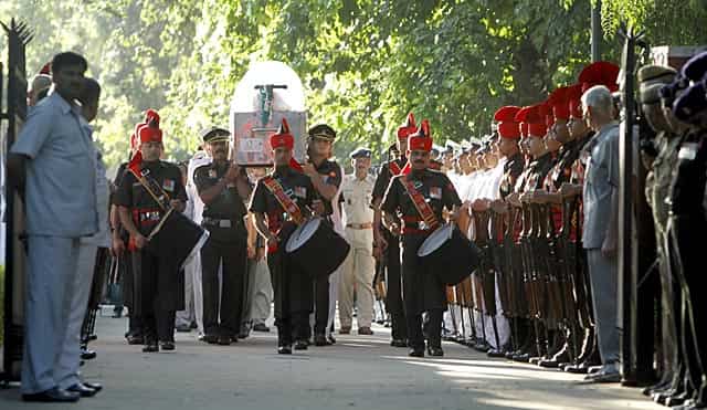 Service personnel carry the mortal remains of Kalam from his residence in New Delhi to the airport from where his body will be taken to Rameswaram on a special aircraft on July 29, 2015. (HT Photo/Arun Sharma) Service personnel carry the mortal remains of Kalam from his residence in New Delhi to the airport from where his body will be taken to Rameswaram on a special aircraft on July 29, 2015. (HT Photo/Arun Sharma)